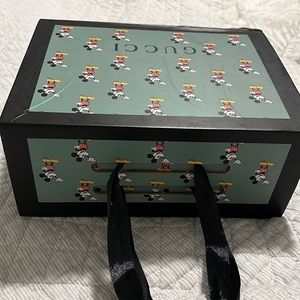 Disney x Gucci empty box with handle and magnetic closure.